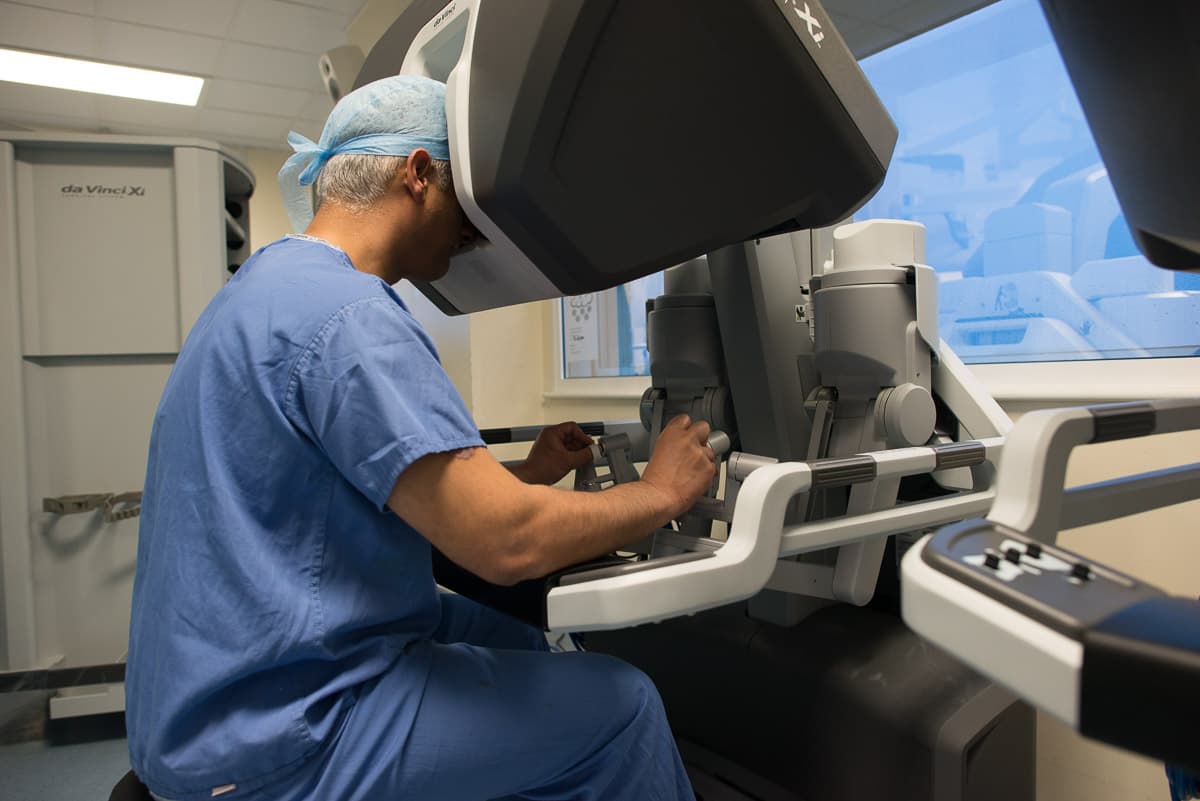 Robotic surgery system in a theatre setting.